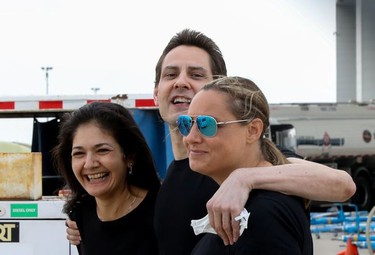 Former diplomat Michael Kovrig, his wife Vina Nadjibulla and sister Ariana Botha react following his arrival on a Canadian air force jet after his release from detention in China, at Pearson International Airport in Toronto, Ontario.