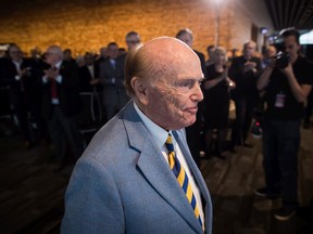 Businessman and philanthropist Jim Pattison returns to his seat after speaking during a Canada's Walk of Fame ceremony honouring him, in Vancouver, on Friday February 15, 2019.