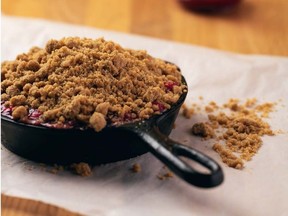 A streusel topping crowns this blueberry crisp, baked in a cast-iron pan to enhance its homeiness. Photo: Henry M. Wu. For Kasey Wilson's column on Oct. 14, 2021. [PNG Merlin Archive]