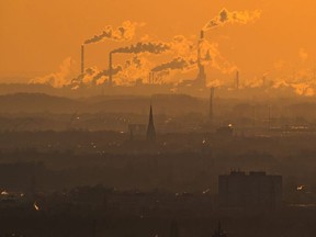 Steam and exhaust rise from different companies on a cold winter day on January 6, 2017 in Oberhausen, Germany.