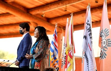 Canada's Prime Minister Justin Trudeau and Kukpi7 Rosanne Casimir speak to the press and Tk'emlups te Secweepemc community members and First Nations leaders at the Tk'emlups Pow wow Arbour in B.C., Oct. 18, 2021.