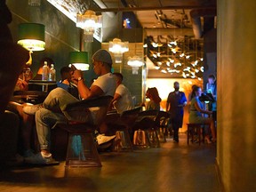 The scene inside Laowai cocktail bar on East Georgia Street in Vancouver. Lewis Hart, captivated by the international heyday of Shanghai’s fabled golden era and its speakeasy culture of the 1920s, wanted that vibe.