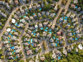 Surging demand for housing during the pandemic has led Canada's mortgage insurer and the Bank of Canada to warn of escalating risks.Credit: Getty