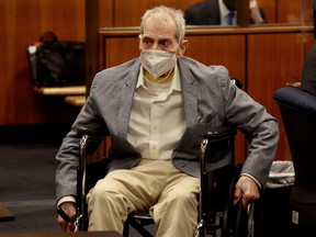 FILE PHOTO: Robert Durst in his wheelchair looks at people in the courtroom as he appears in an Inglewood courtroom with his attorneys for closing arguments in his murder trial at the Inglewood Courthouse in California, U.S., September 8, 2021.  Al Sieb/Pool via REUTERS/File Photo