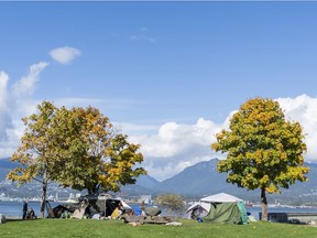 Homeless campers set up their tents at CRAB Park in Vancouver, BC, October, 10, 2021.