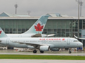 VANCOUVER, BC - Oct. 17, 2021  - Air Canada flights take-off and land at YVR  in Richmond, BC, Oct. 17, 2021. Hong Kong bans AC flights out of Vancouver due to Covid-19 exposures. (Arlen Redekop / PNG staff photo) (story by Joanne Lee-Young) [PNG Merlin Archive]