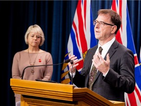 Health minister Adrian Dix and chief provincial health officer Dr. Bonnie Henry provide an update on COVID-19 on Oct. 26 2021.