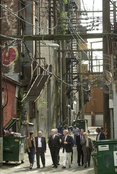 John Manley (CENTRE), Philip Owen (TO RIGHT) and Leonard George (TO LEFT) tour downtown Eastside in 2003
