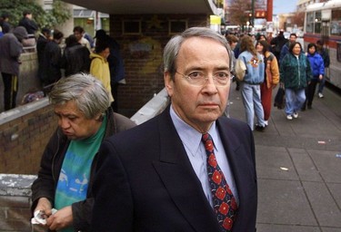 2000. Mayor Philip Owen outside Carnegie Centre at Main and Hastings.