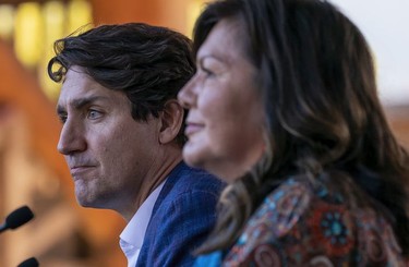 Prime Minister Justin Trudeau pauses for a moment as he listens to Chief Rosanne Casimir as she speaks at the TkÕemlups the Sewepemc in Kamloops, Oct. 18, 2021.