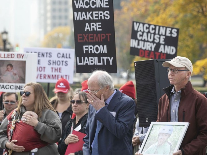  Ted Kuntz (centre) Director and Vice President of Vaccine Choice Canada, joins fellow protesters in observing a minute’s silence during a rally outside the Ontario Legislature in Toronto on Tuesday October 29, 2019. The group announced the filing a constitutional challenge against the province’s vaccination law.