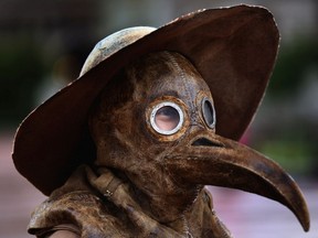A modern-day take on the notorious ‘plague doctor’ of Medieval Europe, whose signature look was the beak-like mask.