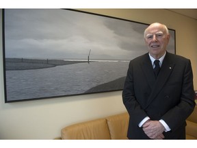 Art collector/philanthropist and Polygon chairman Michael Audain is seen here in Polygon’s offices in Vancouver. The work behind him, by B.C. artist Takeo Tanabe, is of the Jordan River on Vancouver Island and titled Rivers 1/01: Jordan River 2001.