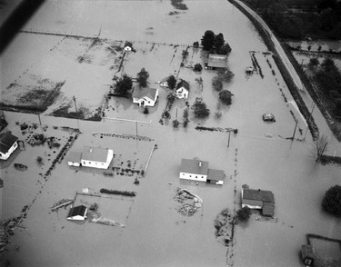 1948 Fraser River Flood - Port Mann - Aerial view of flooding around houses. 1948. Vancouver Sun.