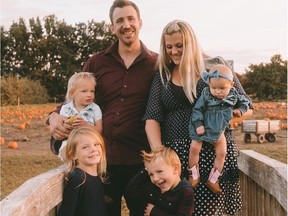Phil and Trina Graham and their kids. The family's Abbotsford dairy farm was flooded this week. A friend has started a GoFundMe page to help them get back on their feet.