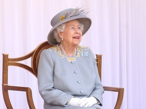 Queen Elizabeth II attends a military ceremony in the Quadrangle of Windsor Castle to mark her Official Birthday on June 12, 2021 in Windsor, England.