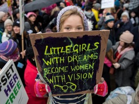 Orla Dean, 5, holds a placard during the Time's Up rally at Richmond Terrace, opposite Downing Street on January 21, 2018 in London, England. The Time's Up Women's March marks the one year anniversary of the first Women's March in London and in 2018 it is inspired by the Time's Up movement against sexual abuse. The Time's Up initiative was launched at the start of January 2018 as a response to the #MeToo movement and the Harvey Weinstein scandal.