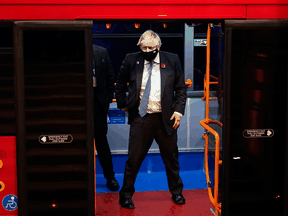 British Prime Minister Boris Johnson arrives on an electric bus with other leaders and attendees for a reception to mark the opening day of the COP26 summit on November 1, 2021 in Glasgow, Scotland.
