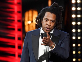 Jay-Z speaks after being inducted into the Rock and Roll Hall of Fame, in Cleveland, Ohio, Oct. 30, 2021.