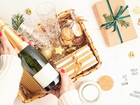 Wine is an instantly festive gift that can bring people, history and culture together — in one package. GETTY IMAGES