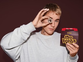 Justin Bieber and Tim Hortons have released a collaboration to bring new menu and merch items to restaurants in Canada and the U.S.