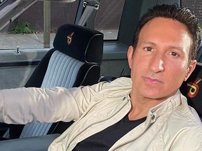 Actor William DeMeo sitting in a car.