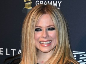 Canadian/French singer Avril Lavigne arrives for the Recording Academy and Clive Davis pre-Grammy gala at the Beverly Hilton hotel in Beverly Hills, California on January 25, 2020. (Photo by Mark RALSTON / AFP)