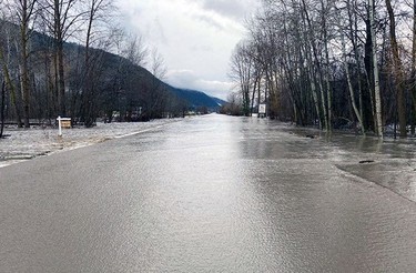 This handout photo released on November 15, 2021 by the British Columbia Ministry of Transportation and Safety shows storm waters on Highway 3 between Bromley Rock Provincial Park and Taylor Mill near Princeton, British Columbia.