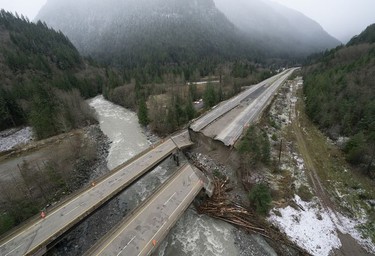 Damage caused by heavy rains and mudslides earlier in the week is pictured along the Coquihalla highway near Hope, B.C., Thursday, November 18, 2021.
