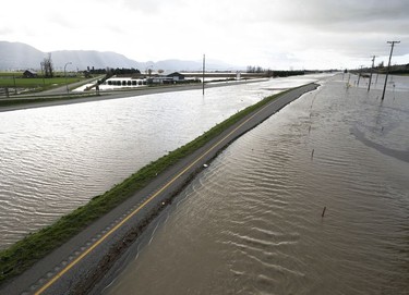Flooding on Highway 1 looking westbound towards Abbotsford is seen in Chilliwack, B.C., Tuesday, November 16, 2021.