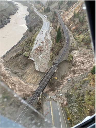 An aerial view shows a damaged road as a flood sweeps through, near Lytton, British Columbia, Canada, November 15, 2021.