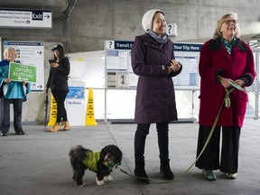 Leader of the Green Party Elizabeth May (R) campaigns with Green candidate Amita Kuttner at the Brentwood Skytrain station, Burnaby, October 19 2019.