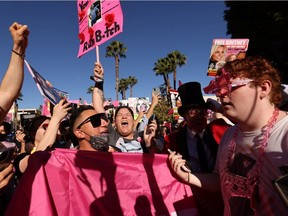 Supporters of singer Britney Spears celebrate as Spears' conservatorship is terminated, outside the Stanley Mosk Courthouse on the day of her conservatorship case hearing, in Los Angeles, California, U.S. November 12, 2021.