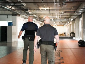 Surrey Police Service recruits participate in a training exercise designed to teach experienced police officers the policies and procedures adopted by the SPS.