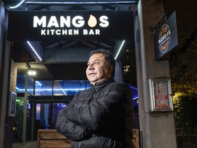 Hugo Porras, owner of Mango's Kitchen and Bar, poses for a photo outside the restaurant in Vancouver, BC, November, 7, 2021. Porras is among a number of business owners asking for dancing (with masks) to be allowed in small venues like his.