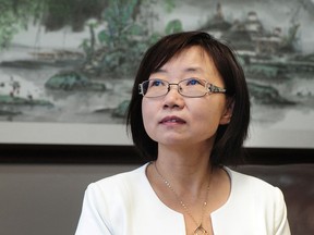 File photo of lawyer Hong Guo in her office in Richmond in 2016.