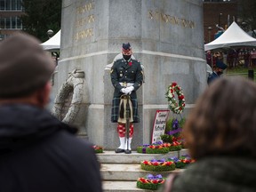 File photo: Salutes at the cenotaph during Remembrance Day ceremony at Victory Square in Vancouver, BC.