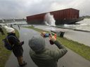 During a storm in mid-November, 'The Barge' came loose from its mooring and crashed ashore near the Burrard Street Bridge.