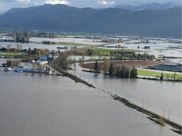 Handout photos from Mayor Henry Braun and Abbotsford Police Department's aerial tour of the Sumas Prairie on Police Helicopter Air 1 on November 16, 2021.