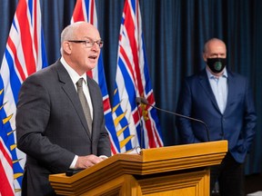 Premier John Horgan and Mike Farnworth, Minister of Public Safety and Solicitor General.