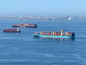 Container ships wait off the coast of the congested Ports of Los Angeles and Long Beach in Long Beach, California, U.S., October 1, 2021.