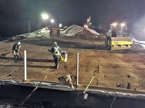 Road repairs are going around the clock at several sites, including these repairs to the Bottletop Bridge on Highway 5, the Coquihalla, where approaches at one end of the twin freeway bridge were wiped out by flooding caused by the Nov. 14-15 atmospheric river.