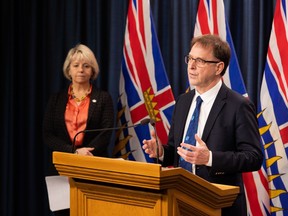 B.C. Health Minister Adrian Dix said "all health authorities are in the process of updating their contingency plans," calling this "an incredibly stretched time." In a file photo, Dix and provincial health officer Dr. Bonnie Henry provide an update on COVID-19.