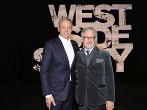 Bob Iger (L) and Steven Spielberg attend the New York premiere of West Side Story on November 29, 2021 in New York City.