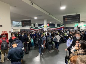 All passengers arriving at Mexico City International Airport must clear customs, even if they're catching a connecting flight out of the country. This was the scene at around 5 a.m. local time on Nov. 6 as passengers waited to get through customs, collect their bags and, in Postmedia News writer Gordon McIntyre's case, get onto the plane flying him to Managua, Nicaragua.