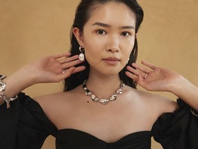 A model wears pieces from the Toronto-based jewelry brand Biko.