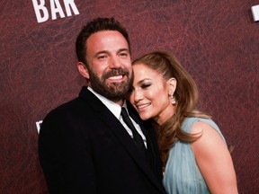 Ben Affleck and Jennifer Lopez attend the premiere for the film "The Tender Bar" at The TLC Chinese Theater in Los Angeles on Dec. 12, 2021.