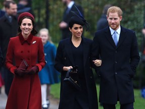 (L-R) Catherine, Duchess of Cambridge, Meghan, Duchess of Sussex and Prince Harry, Duke of Sussex arrive to attend Christmas Day Church service at Church of St Mary Magdalene on the Sandringham estate on December 25, 2018 in King's Lynn, England. (Photo by Stephen Pond/Getty Images)