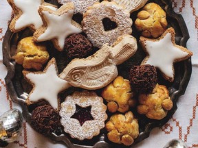 Bethmännchen (almond domes) from Advent: Festive German Bakes to Celebrate the Coming of Christmas. Also pictured: Zimtsterne, Springerle, Doppeldecker, Rumkugeln.