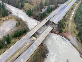 FILE PHOTO: The Coquihalla Highway 5 is severed at Sowaqua Creek after devastating rain storms caused flooding and landslides, northeast of Hope. Nov. 2021.